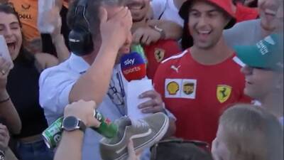 Ted Kravitz delights Australian GP fans as he sinks shoey