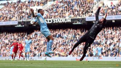 Man City, Liverpool share spoils in pulsating title clash