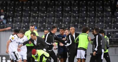 Porto clash halted after fan walks onto pitch and tries to kick player in ugly scenes