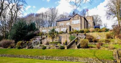 Huge castle-like mansion in Greater Manchester with eight bedrooms, a swimming pool, cinema and a tunnel