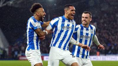 Huddersfield beat fellow promotion hopefuls Luton to move up to third