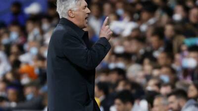 Ancelotti happy to suffer as Real Madrid battle to make last four