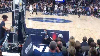 Animal rights activist glues herself to floor during NBA play-in game with message to T'Wolves owner