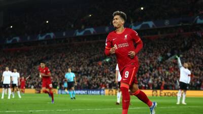 Roberto Firmino nets double as Liverpool reach semis despite draw with Benfica