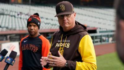 Giants first base coach Antoan Richardson and Padres third base coach Mike Shildt clear the air after confrontation