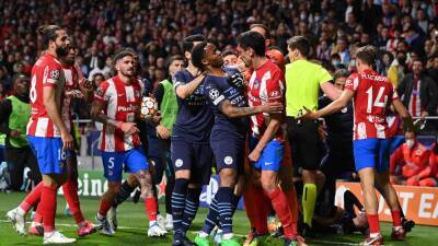 Manchester City praised for keeping their focus in heated Champions League battle against Atletico Madrid.