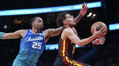Trae Young, De'Andre Hunter lead Hawks to play-in rout of Hornets