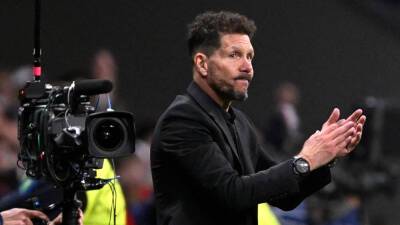 Simeone aims dig at Guardiola after Atletico and City players scrap in tunnel