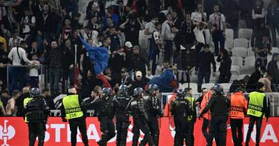 Lyon fans attempt to enter pitch after loss to West Ham in Europa League quarter-finals