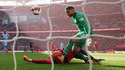 Liverpool keep quadruple bid alive by beating Manchester City in FA Cup