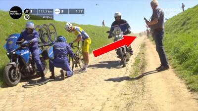 ‘Look where he’s stopped!’ – Terrifying near-miss as leader changes wheel in middle of road at Paris-Roubaix