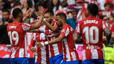 Atletico Madrid 2-1 Espanyol: Yannick Carrasco scores last-minute penalty to snatch three points