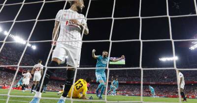 Soccer-Real Madrid recover to beat Sevilla 3-2 and move closer to title
