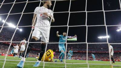 Real Madrid recover to beat Sevilla 3-2 and move closer to title
