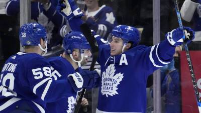 Maple Leafs beat Islanders, break team wins and points marks