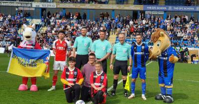 Ukrainian refugee leads Gillingham on to pitch just days after arriving in UK