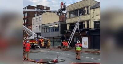 Student block evacuated as firefighters tackle blaze at derelict building in Bolton