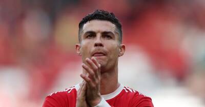Liverpool and Manchester United fans show Cristiano Ronaldo support with seventh minute applause after death of his son