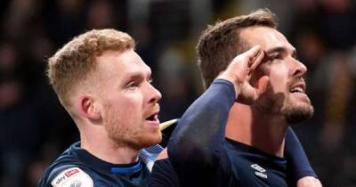 Huddersfield back on track after narrow win at 10-man Hull