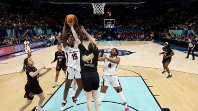 Hailey Van-Lith - Canada's Laeticia Amihere, top-seeded South Carolina down Louisville to reach title game - cbc.ca - Canada -  Boston -  Tokyo -  Louisville - state South Carolina - county Russell - state Connecticut - county Canadian