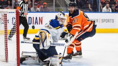 McDavid scores in overtime to carry Oilers past Blues for 9th consecutive home win