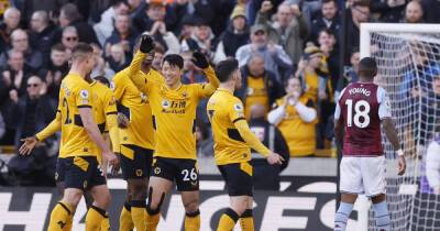 Soccer-Wolves keep European hopes alive with 2-1 win over Villa