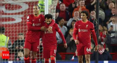 Liverpool thrash miserable Manchester United to go top of Premier League