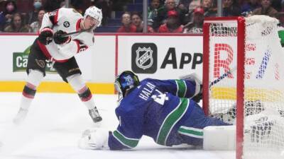 Senators come back to steal key point from Canucks in SO win
