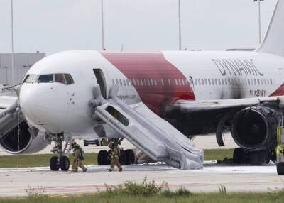 Tarmac tirade: Woman opens emergency exit, flees airplane down inflatable slide