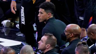 Devin Booker - Phoenix Suns' Devin Booker likely to miss Games 3 and 4 vs. New Orleans Pelicans with mild hamstring strain, sources say - espn.com -  New Orleans