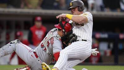 Padres' Luke Voit collides with Reds' Tyler Stephenson at plate, tensions boil