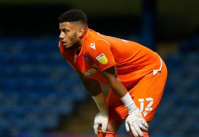 Gillingham goalkeeper Aaron Chapman isn't worried about taking on Portsmouth and Rotherham United as they seek a win for survival