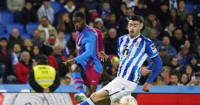 Soccer-Aubameyang strike earns Barcelona tough win at Sociedad