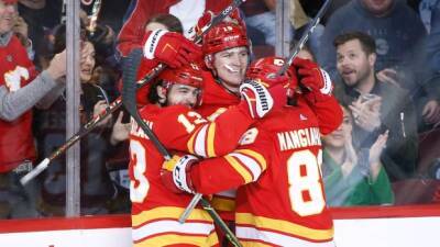Flames clinch Pacific Division title with win over Stars