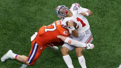 NCAA college football rules panel approves changes to targeting rule, faking injuries
