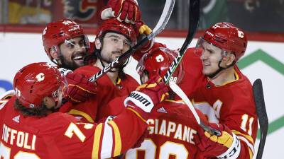 Matthew Tkachuk scores 40th, Flames beat Stars to win Pacific title