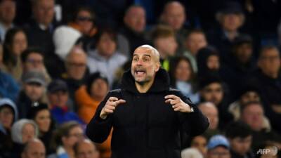 Guardiola 'loves' title tension as Man City bid to hold off Liverpool