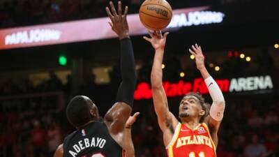 Young hits floater with 4.4 left, Hawks beat Heat