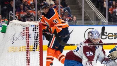 Kane scores hat trick to help Oilers double up Avalanche, clinch playoff spot