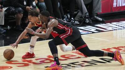 NBA roundup: Trae Young, Hawks nip Heat in final seconds