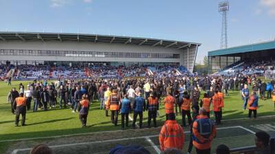 Oldham’s relegation confirmed following chaotic scenes at Boundary Park