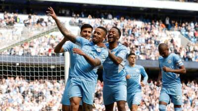 Man City keep up pace in title race, Arsenal go fourth