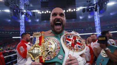 Boxing-Fury bounces back to bow out in style with TKO win