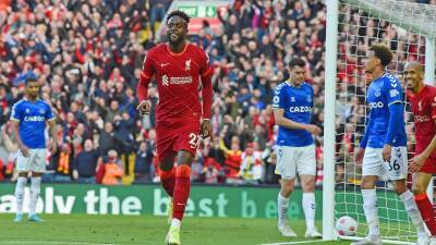 Liverpool defeat Everton 2-0 in Merseyside derby, keep quadruple hopes alive and push crosstown rivals into Premier League relegation zone