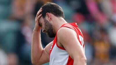 Paddy McCartin fails concussion test in Sydney Swans' comeback AFL win over Hawthorn