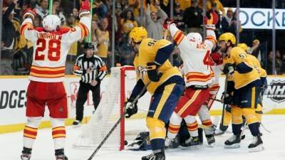 Lindholm scores in OT to push Flames past Predators for 3rd straight win