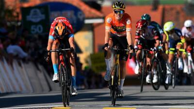 Dylan Teuns snatches Stage 1 victory from Rohan Dennis on the line of the Tour de Romandie after Ethan Hayter crashes