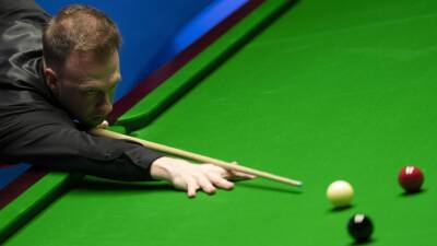 Snooker star Judd Trump sees the funny side as he plays joke on referee