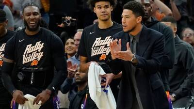 Phoenix Suns' Devin Booker (hamstring strain) progressing toward return soon, sources say