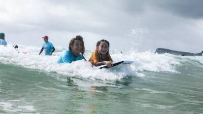 Surfing the Spectrum offers 'life-changing' water therapy for autistic kids